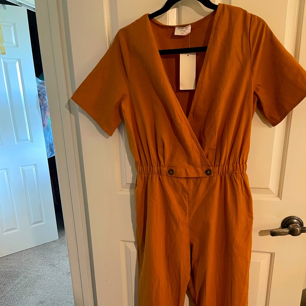 You’ll make heads turn in this cocoa colored Jumpsuit